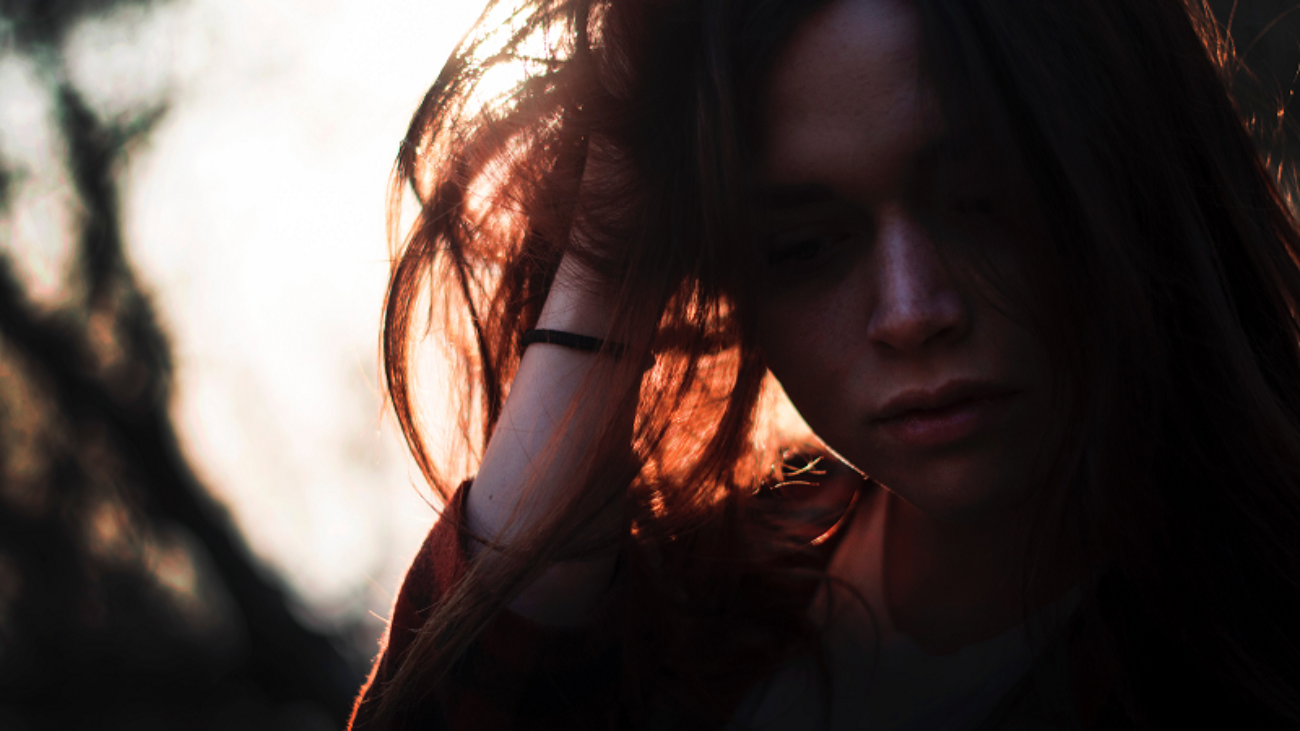 woman-holding-head-hair-stressed